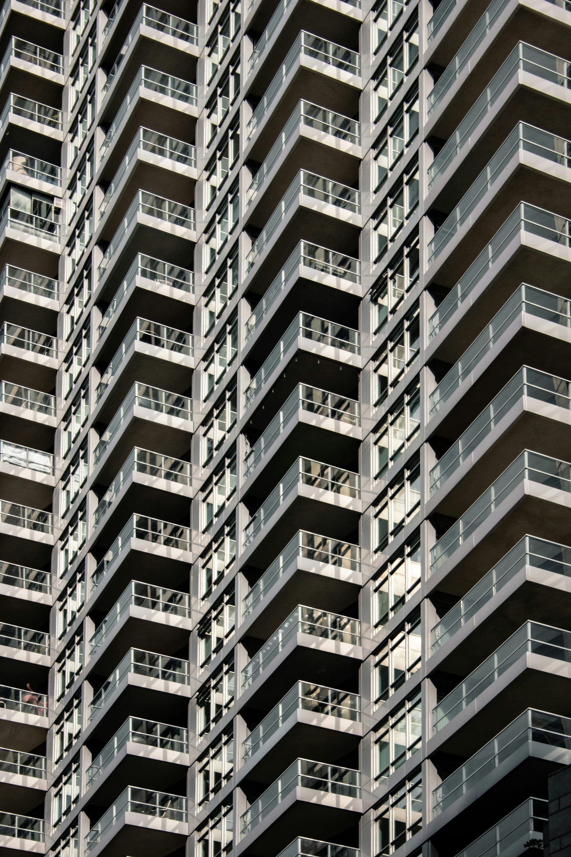 Geometric repeating balcony pattern on modern apartment building